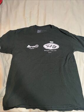 Lira Black Short Sleeve Tee with White Chest Graphics